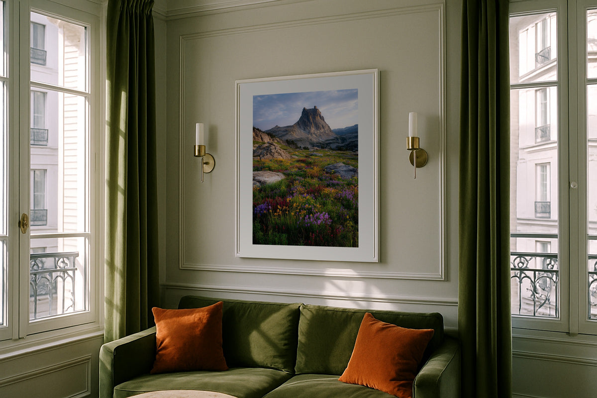 Wildflowers Below Ritter Peak wall art print, framed with a white border, in a snow mountain cabin bedroom