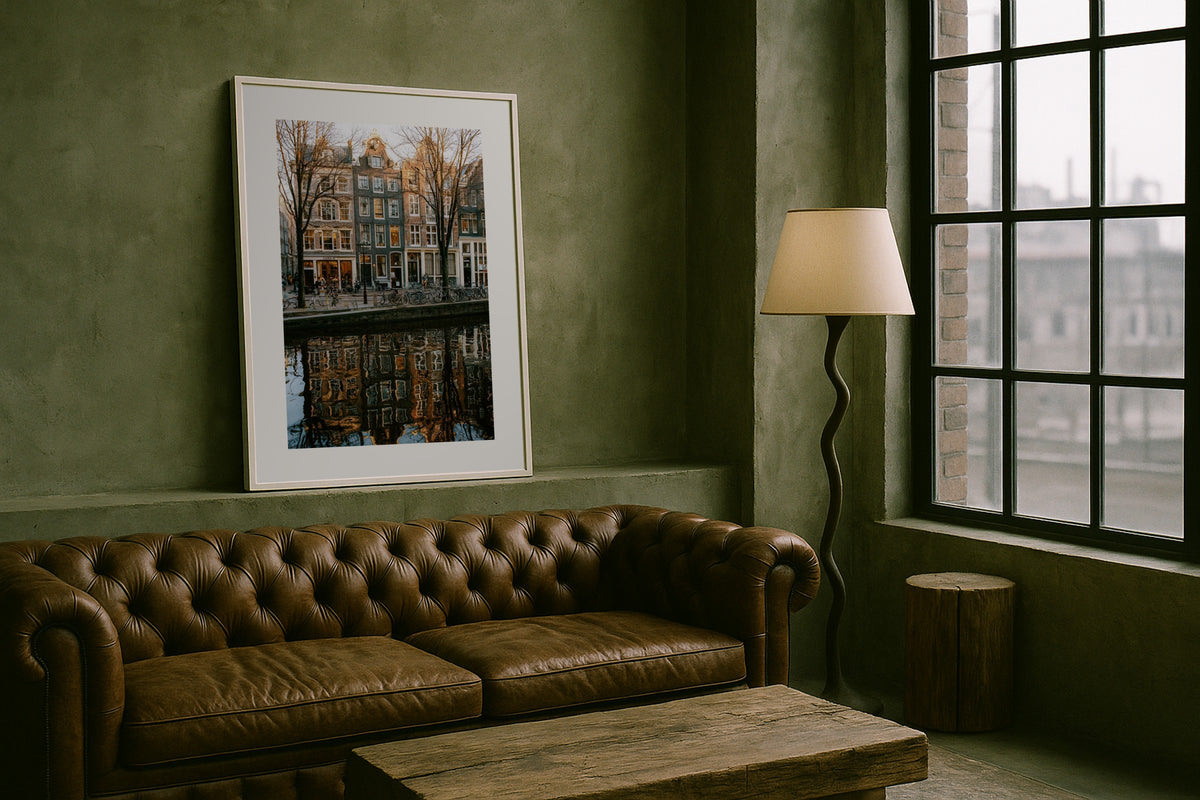 Amsterdam at Golden Hour wall art print, framed with a white border, in a chesterfield loft