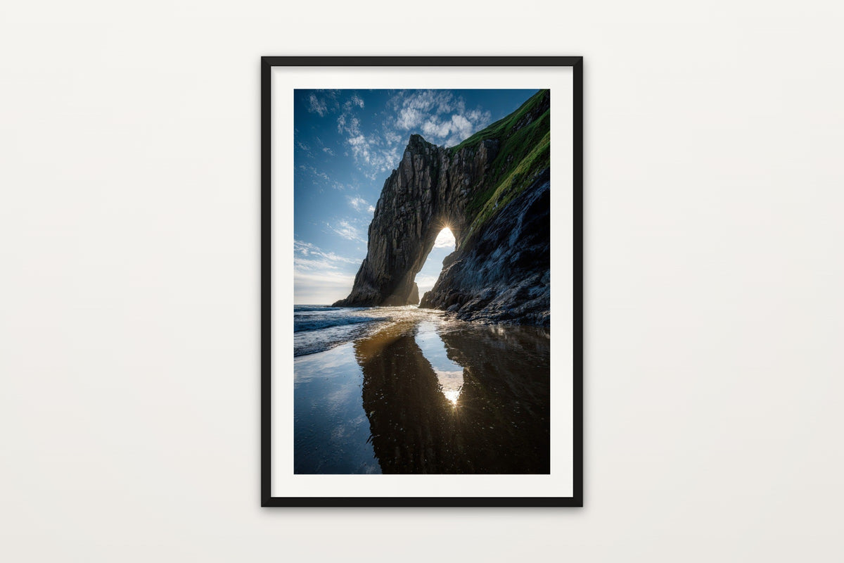 Irish Sea Arch wall art print – A sunburst through a sea arch on the Irish coast