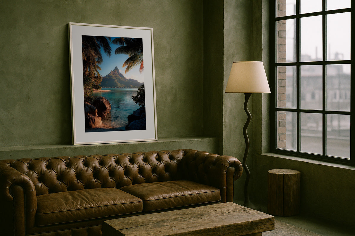 Otemanu Through Palms wall art print, framed with a white border, in a sea windows cream sofa
