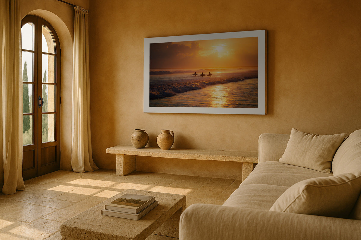 Canggu Surfers wall art print, framed with a white border, in a sea view green sofa