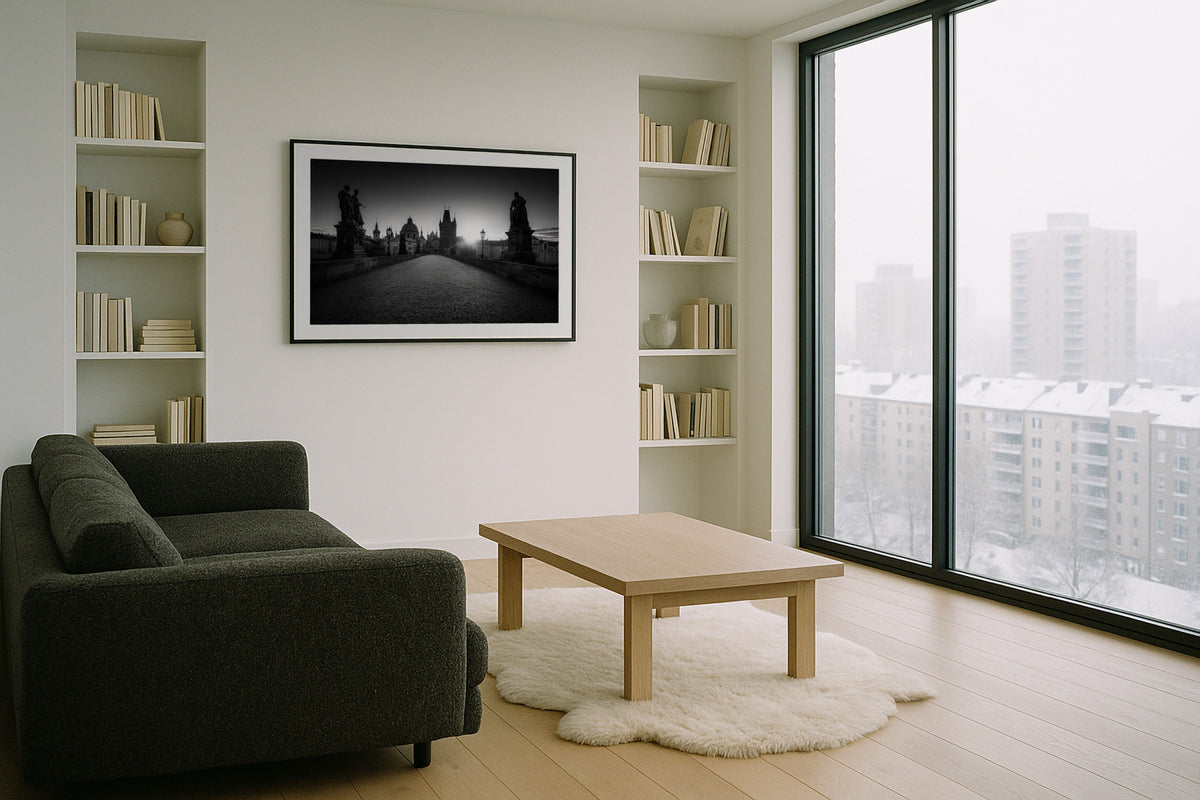 Charles Bridge wall art print, framed with a white border, in a grey city window