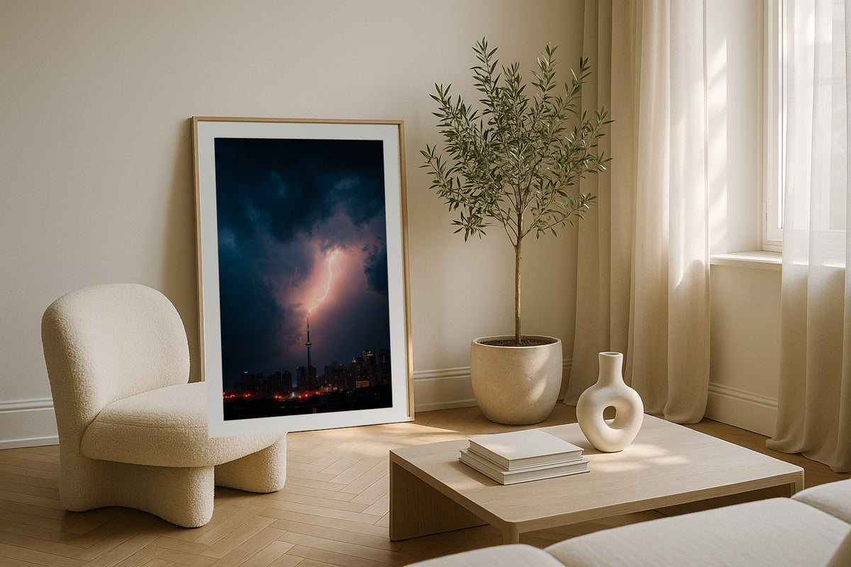 Lightning over Toronto wall art print, framed with a white border, in a NYC Empire State bedroom