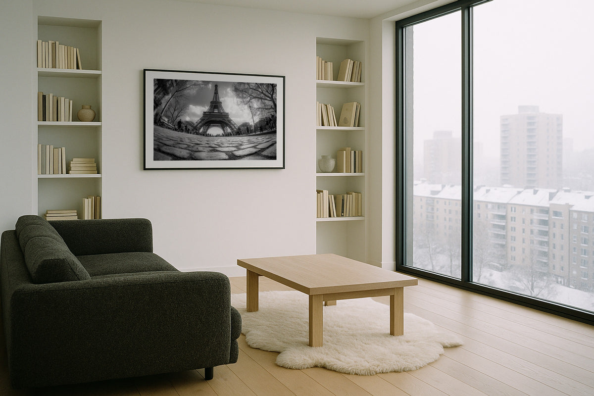 The Eiffel Tower wall art print, framed with a white border, in a grey city window