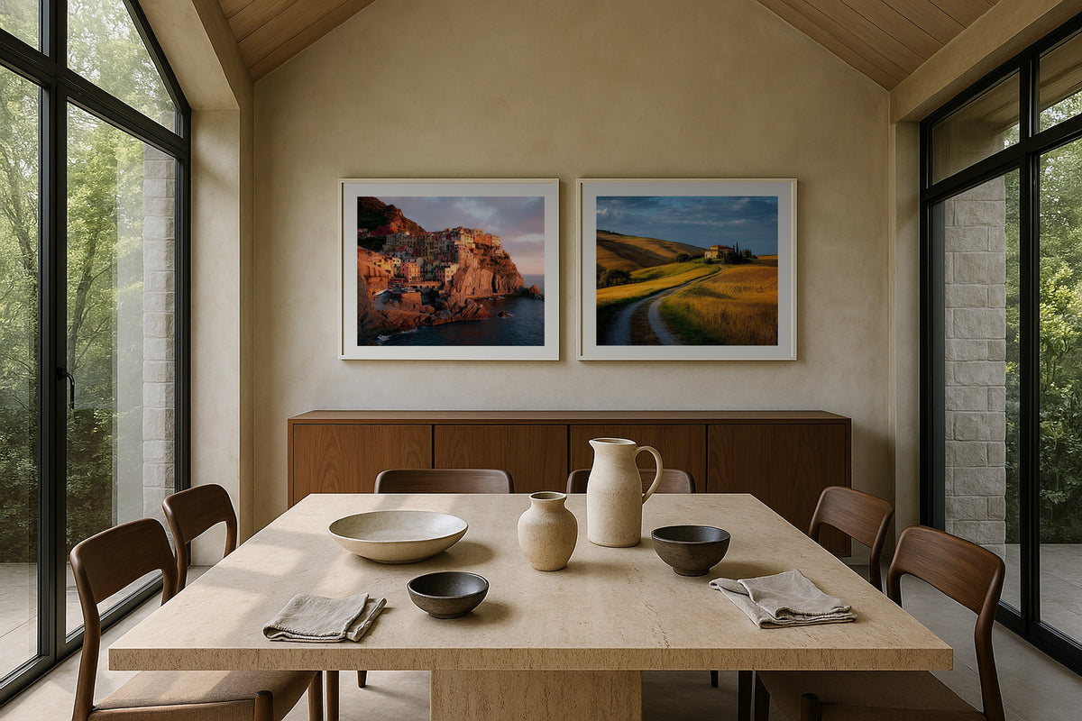 Pair of Italian prints in a dining room: Manarola and Val d'Orcia