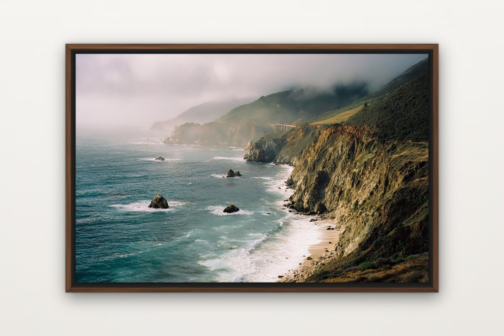 Big Sur as a framed canvas in a dark wood floating frame