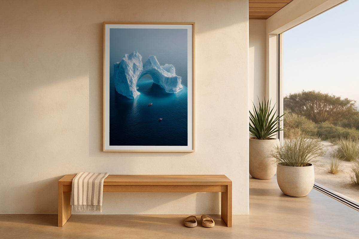 Iceberg Arch wall art print, framed with a white border, in a dune beach bench