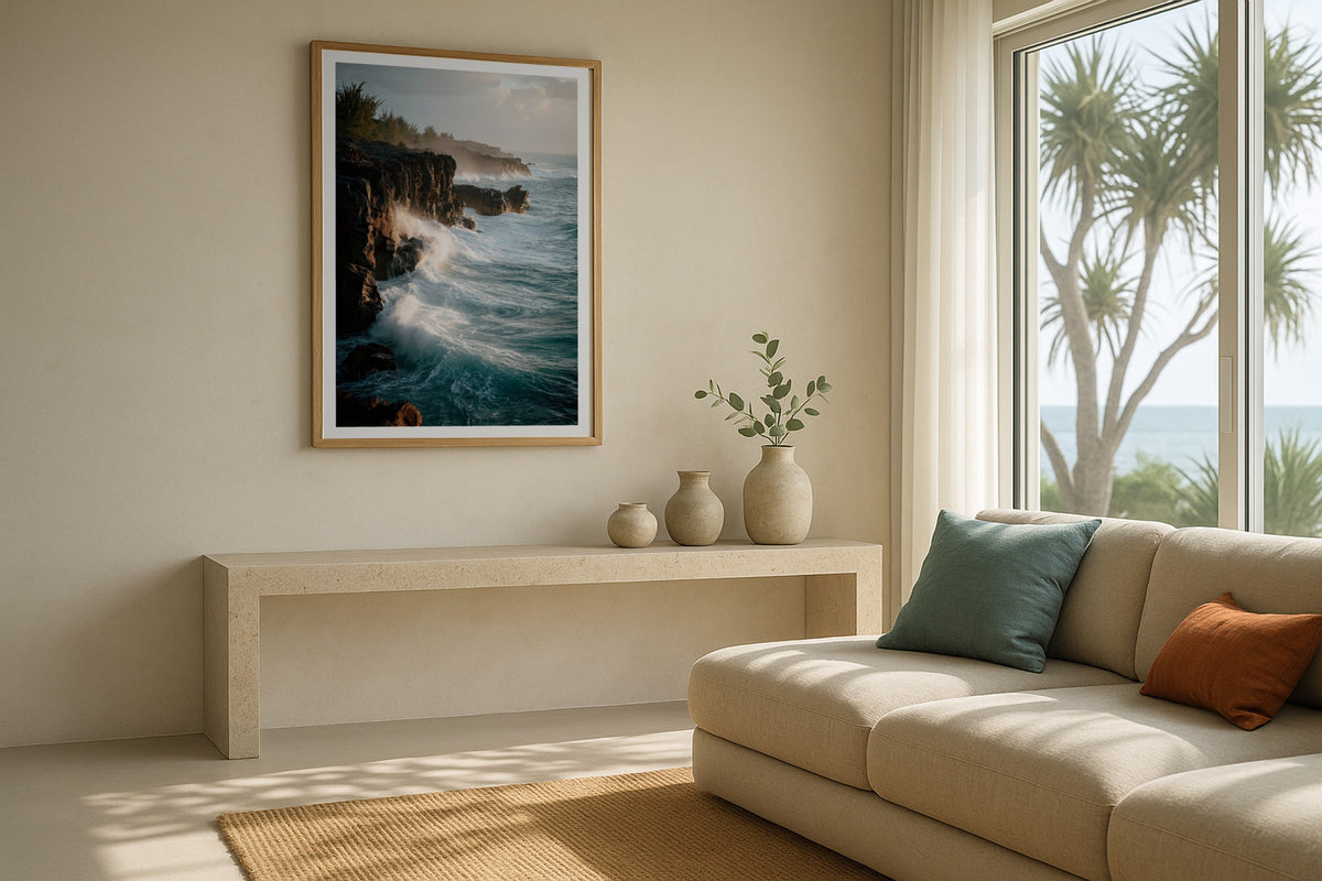 Big Island Lava Cliffs wall art print, framed with a white border, in a coastal console sofa