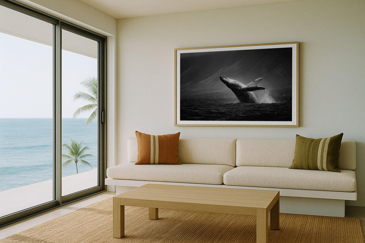 Humpback Whale III wall art print, framed with a white border, in a beach balcony cream sofa