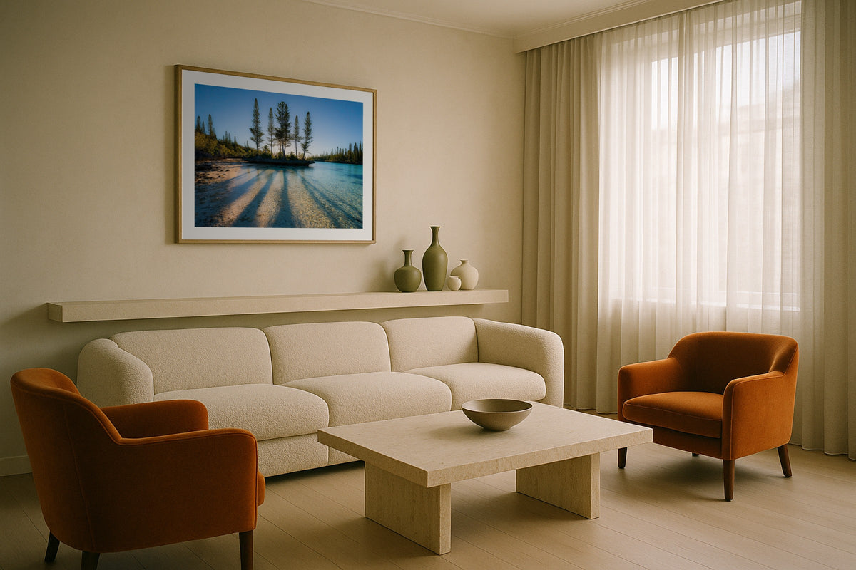 Isle of Pines II wall art print, framed with a white border, in a white coastal fireplace