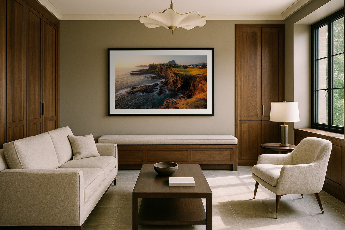 Jeju Cliffs wall art print, framed with a white border, in a leaning fireplace sea view