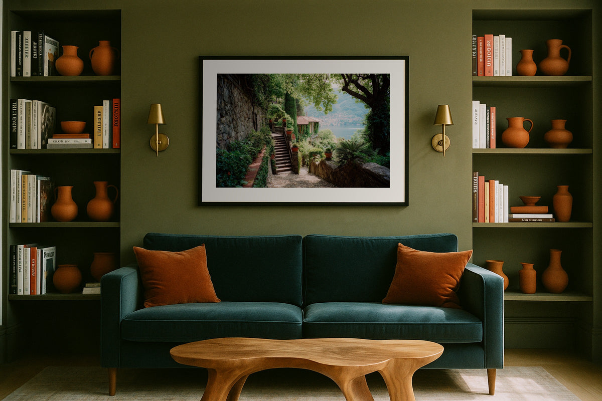 Lake Como Villa Garden wall art print, framed with a white border, in a olive wall sconces bookshelves