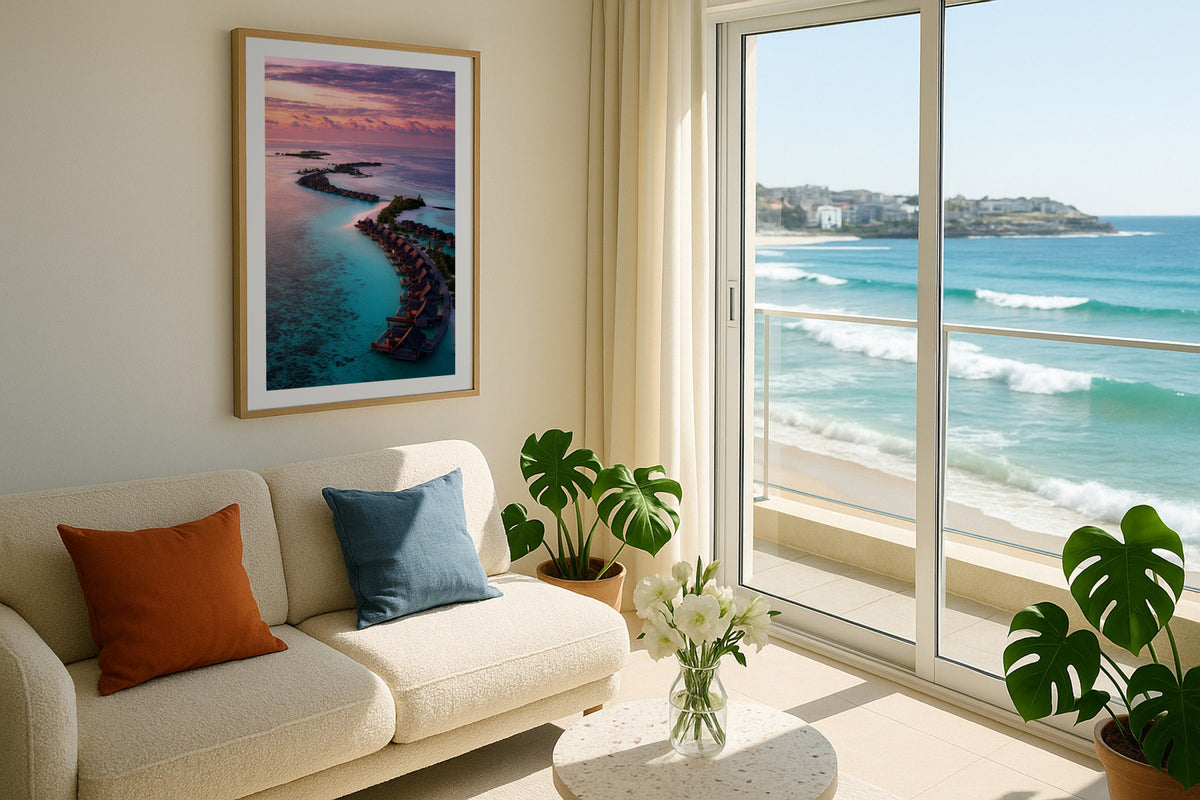 Maldives Lagoon at Sunrise wall art print, framed with a white border, in a Bondi beach balcony