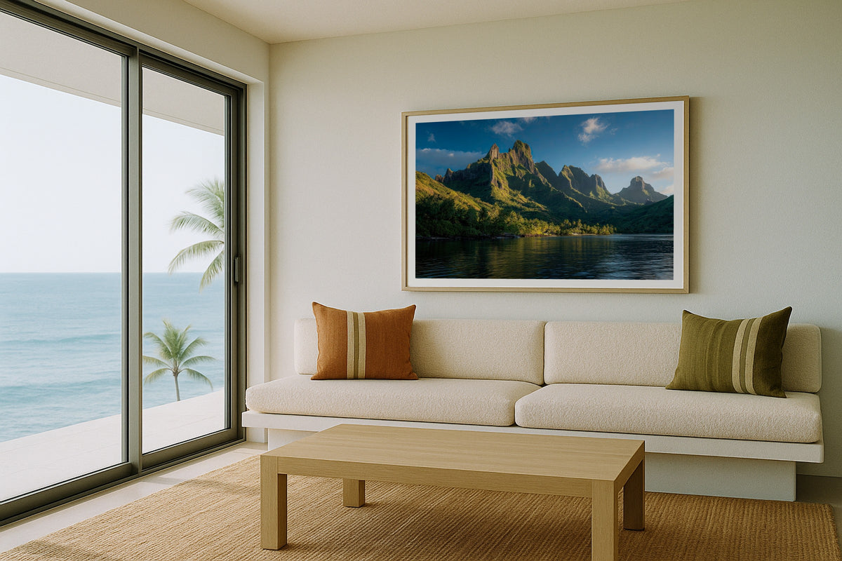 Moorea wall art print, framed with a white border, in a beach balcony cream sofa