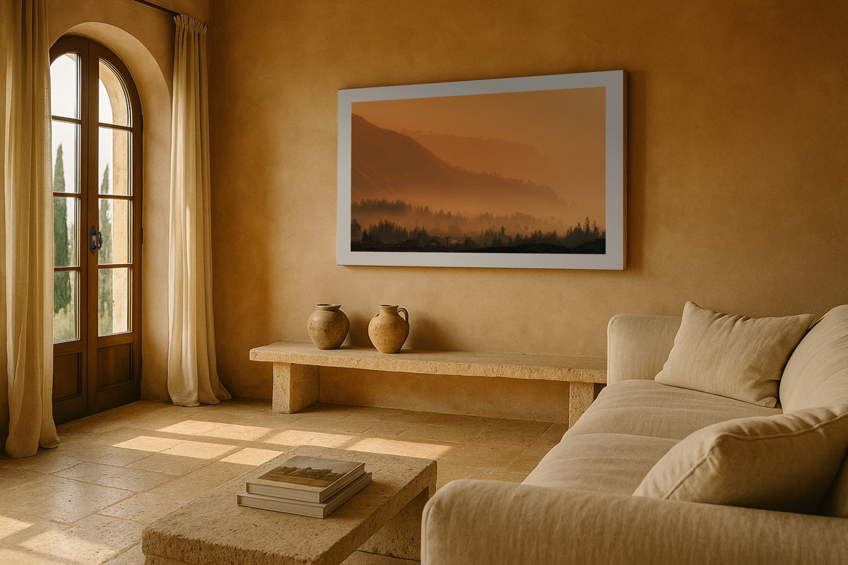Mount Bromo wall art print, framed with a white border, in a bench orange pillows