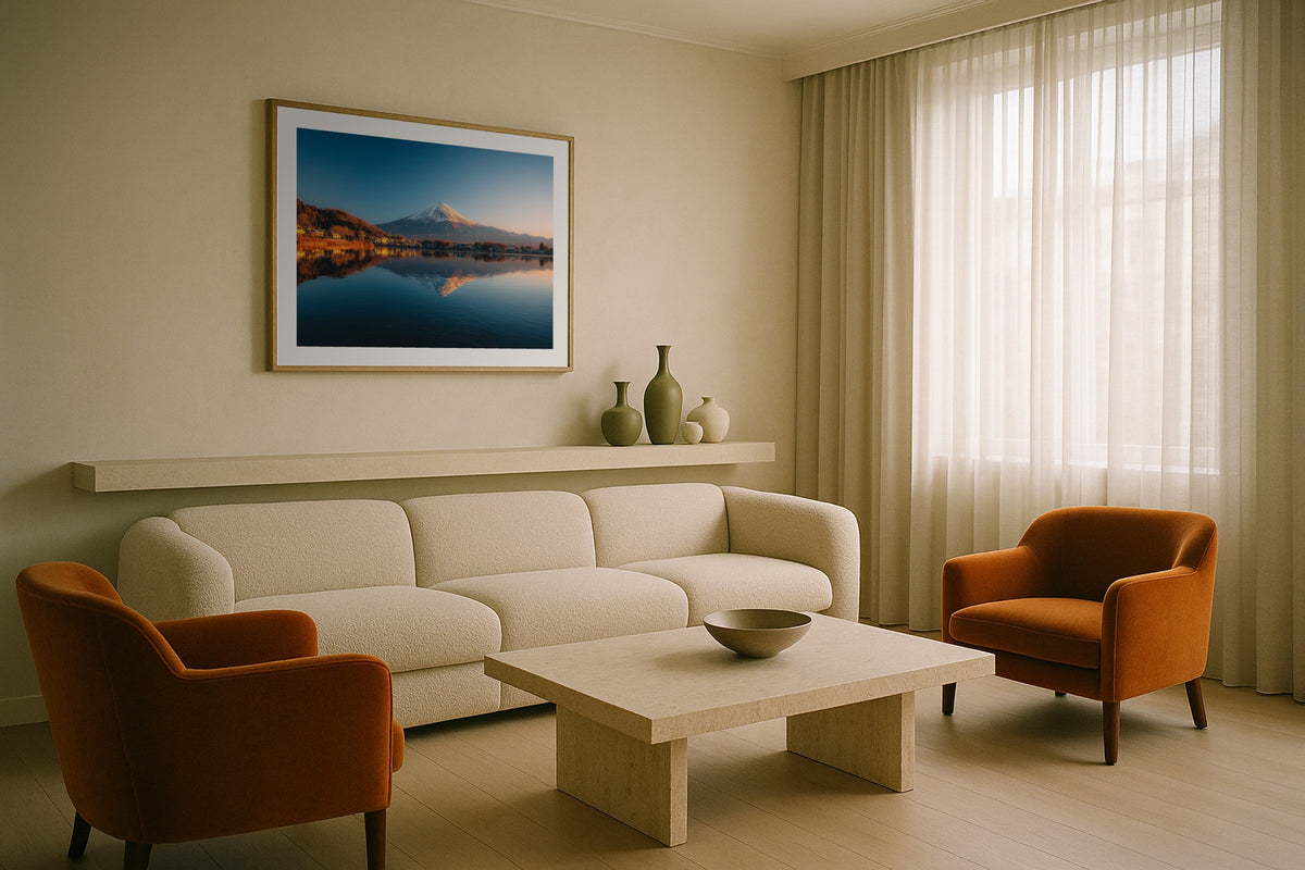 Fuji Reflected wall art print, framed with a white border, in a Alpine chalet green sofa