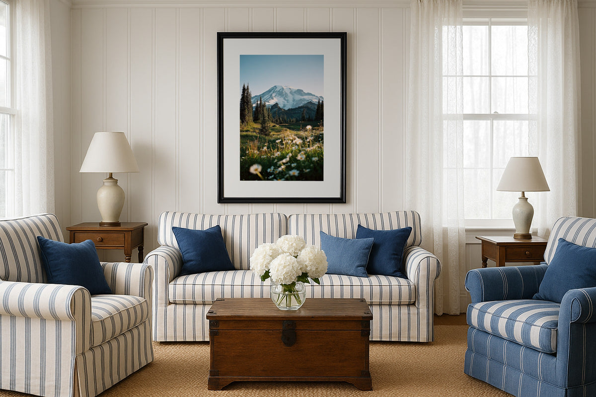 Rainier Wildflowers wall art print, framed with a white border, in a arched windows green sofa