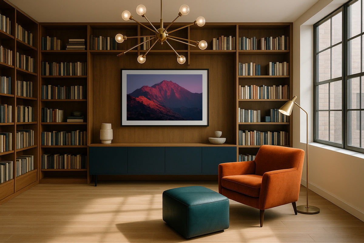 Mount Rinjani wall art print, framed with a white border, in a hotel bedroom wide