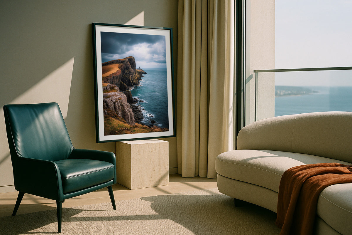 Neist Point wall art print, framed with a white border, in a window seat lamp