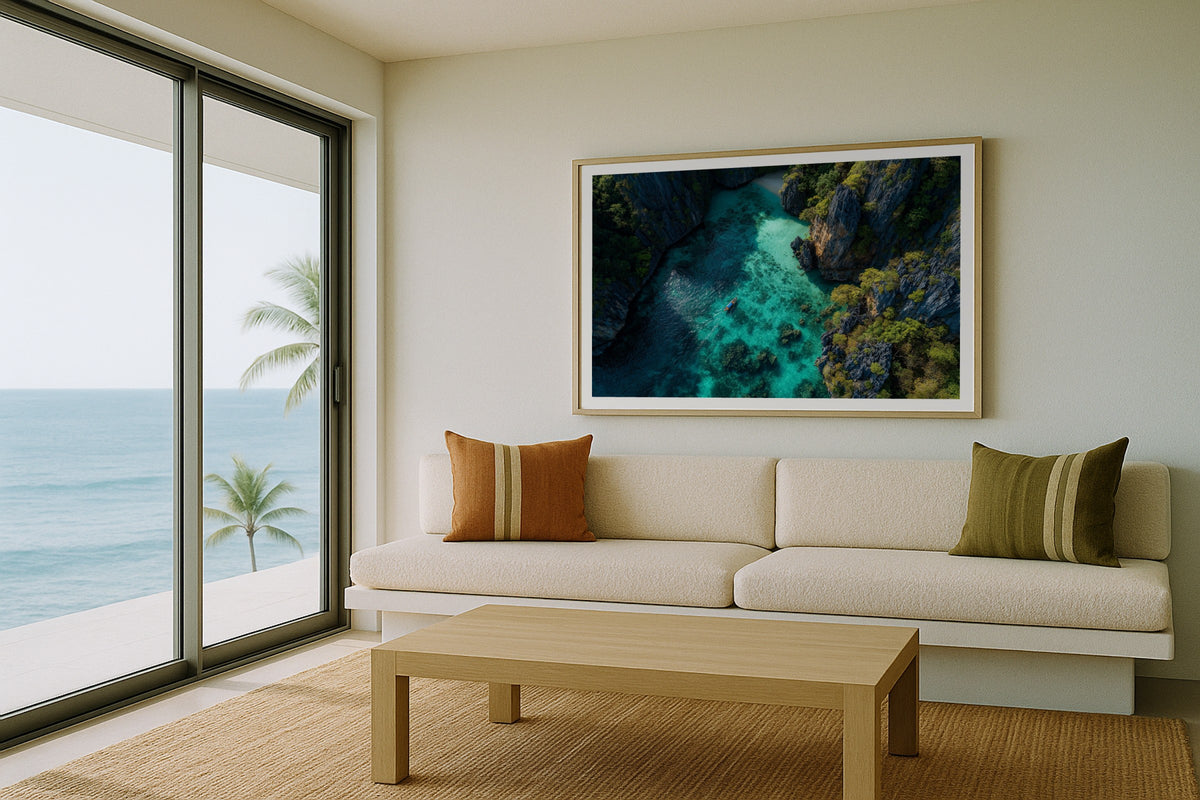 Phi Phi Lagoon wall art print, framed with a white border, in a beach balcony cream sofa