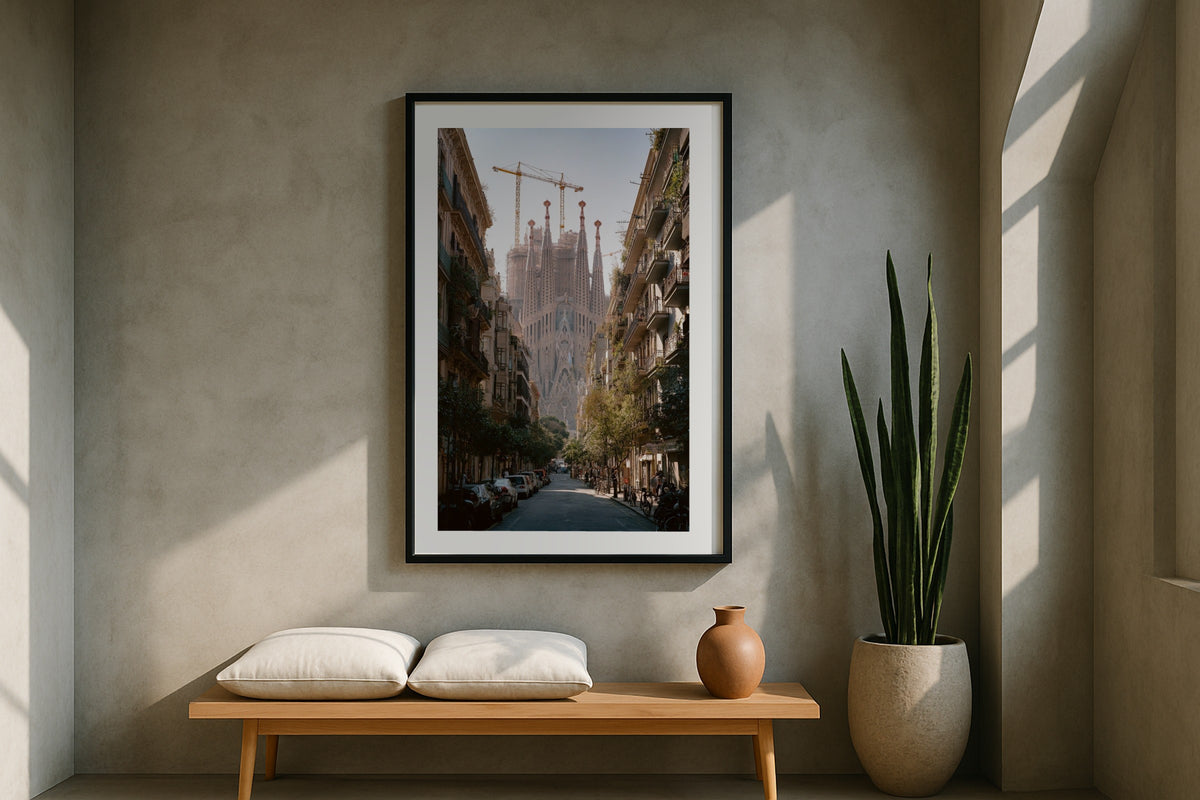Sagrada Família wall art print, framed with a white border, in a London windows fireplace
