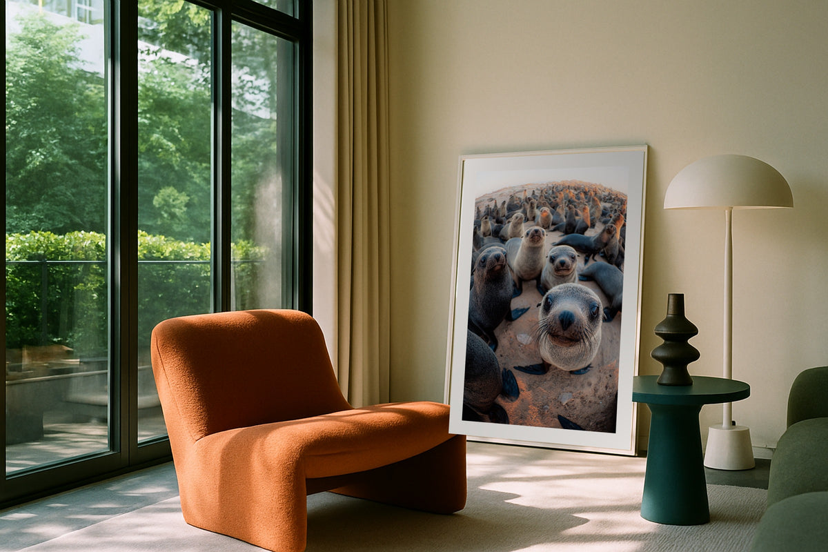 Seal wall art print, framed with a white border, in a leaning garden balcony