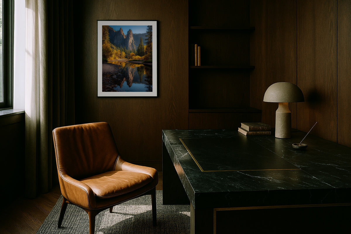 Sentinel Rock wall art print, framed with a white border, in a cream sofa plants