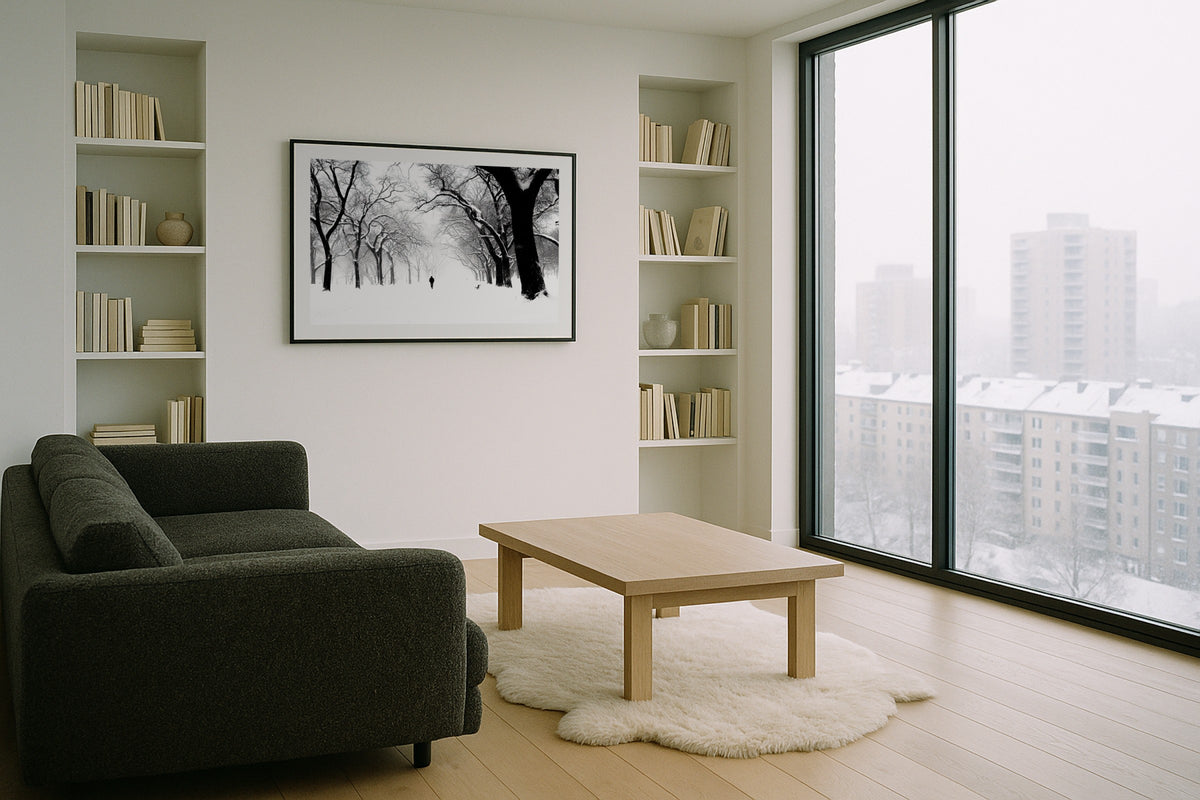 Park Avenue in Snow wall art print, framed with a white border, in a grey city window