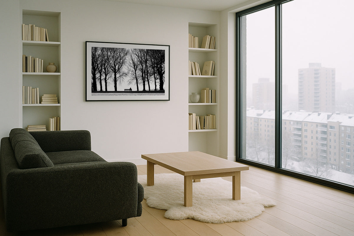 Bench Among Bare Trees wall art print, framed with a white border, in a dark wood office leather chair