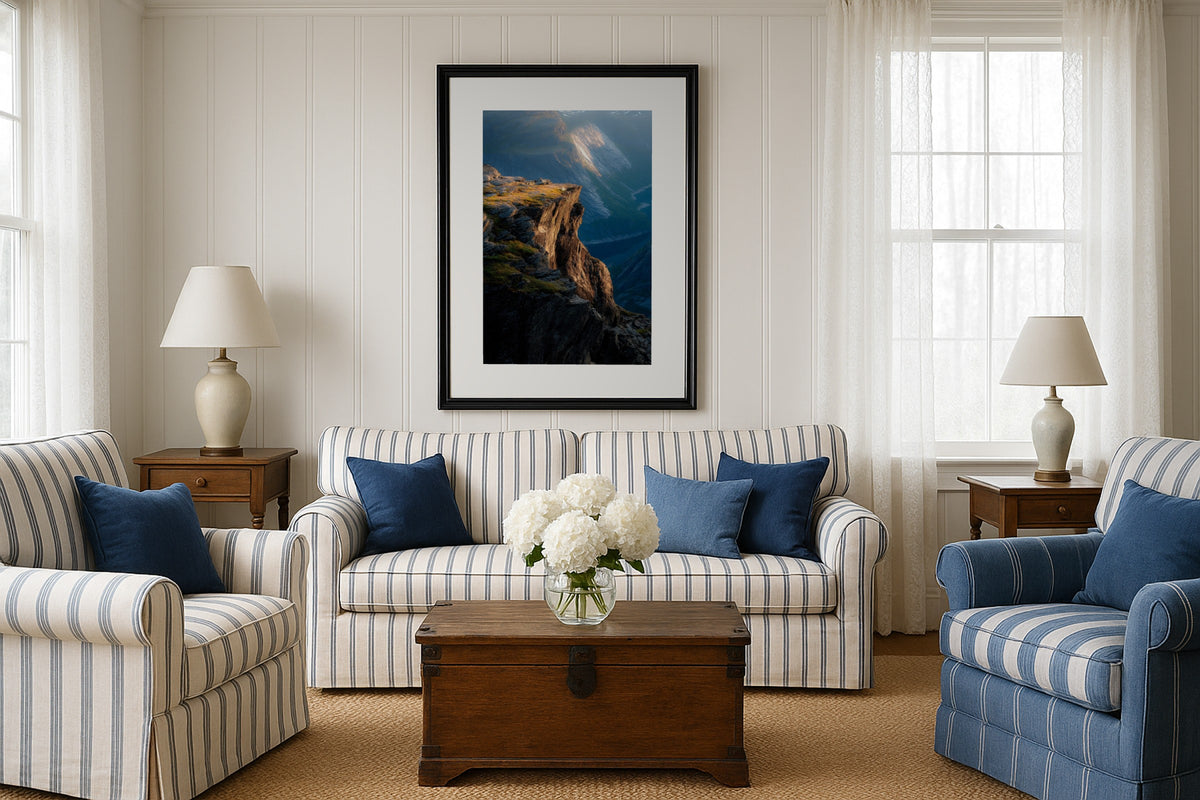 Trolltunga Cliff Edge wall art print, framed with a white border, in a Hamptons striped sofas